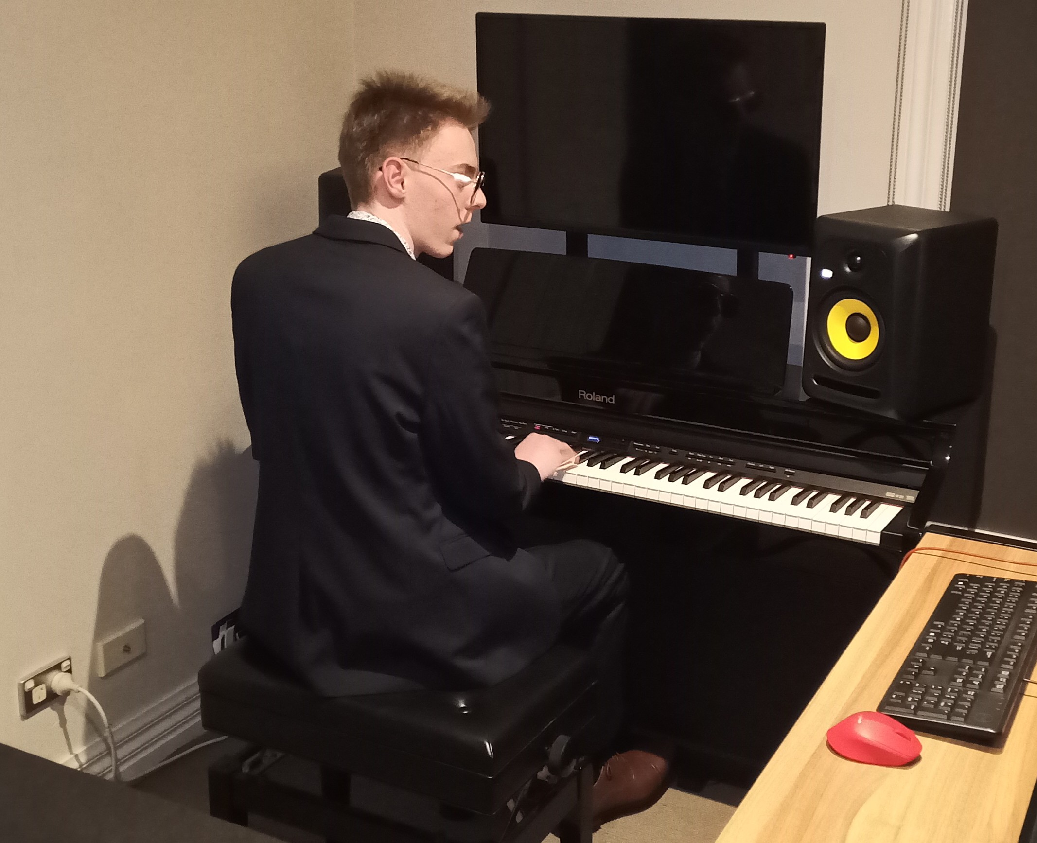 Michael performing in his Studio.