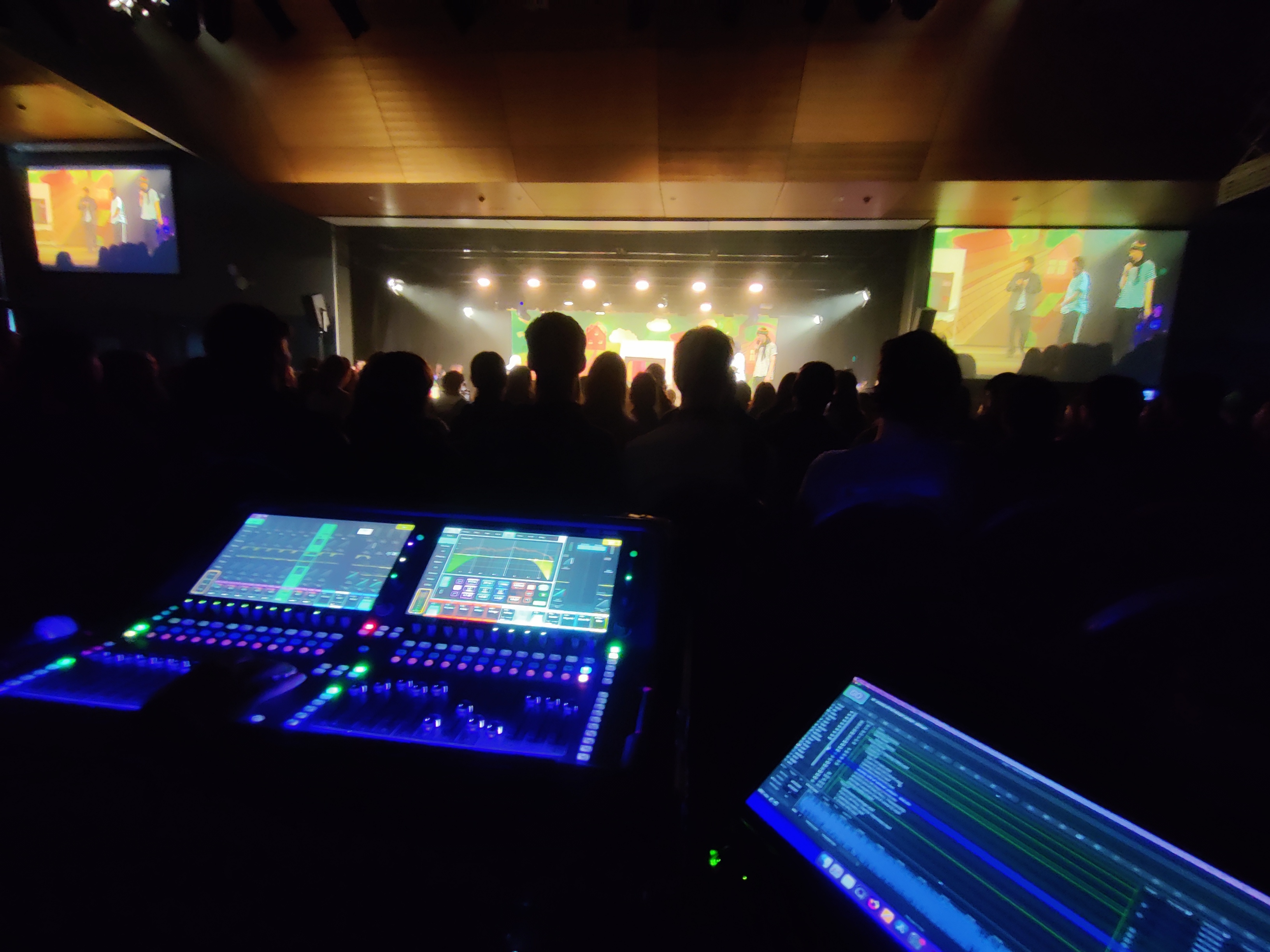 Michael mixing a live event using Audio Engineering skills.